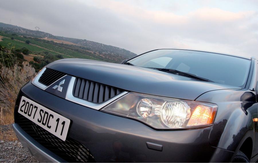  Mitsubishi Outlander 2005 года  (фото 61 из 77)